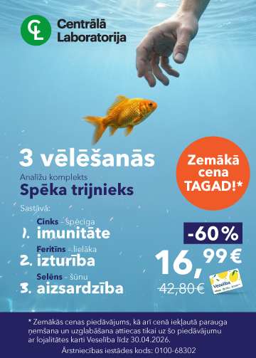 Vīrieties smaidīgs ar Centrālās laboratorijas logo